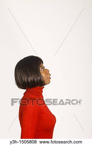 Studio shot of black woman, profile View Large Photo Image Stock Photo - Studio shot of black woman, profile. Fotosearch