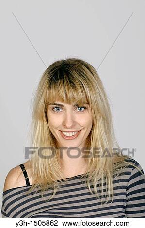 Stock Image - Studio shot of Brazilian woman. Fotosearch