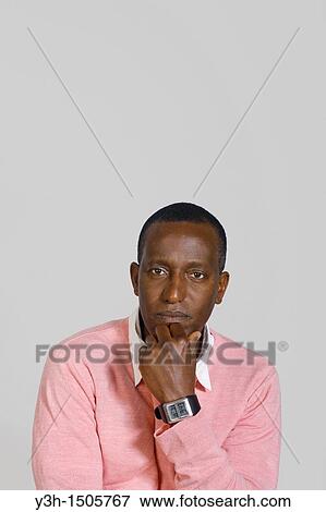 Studio shot of cuban man, looking at camera View Large Photo Image Stock Photo - Studio shot of cuban man, looking at camera. Fotosearch