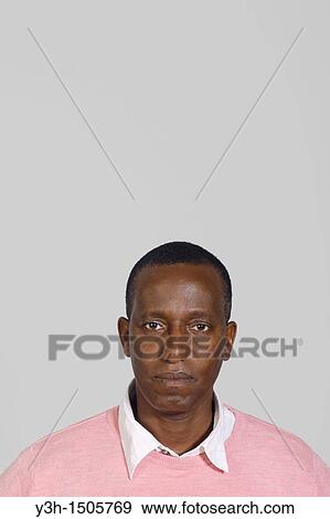 Studio shot of cuban man, looking at camera View Large Photo Image Stock Photo - Studio shot of cuban man, looking at camera. Fotosearch