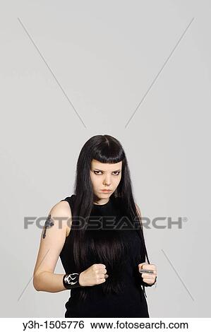 Stock Photograph - Studio shot of gothic teen girl. Fotosearch