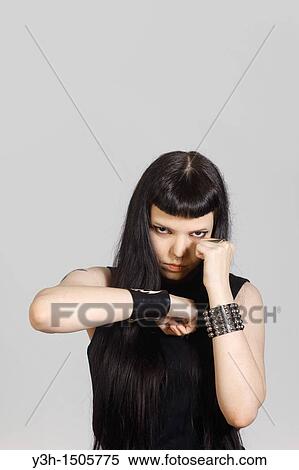 Stock Photography - Studio shot of gothic teen girl. Fotosearch