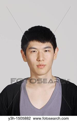 Studio shot of Korean man View Large Photo Image Stock Image - Studio shot of Korean man. Fotosearch