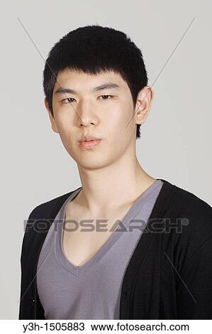 Studio shot of Korean man View Large Photo Image Stock Image - Studio shot of Korean man. Fotosearch