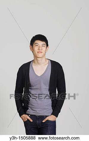 Studio shot of Korean man View Large Photo Image Stock Photo - Studio shot of Korean man. Fotosearch