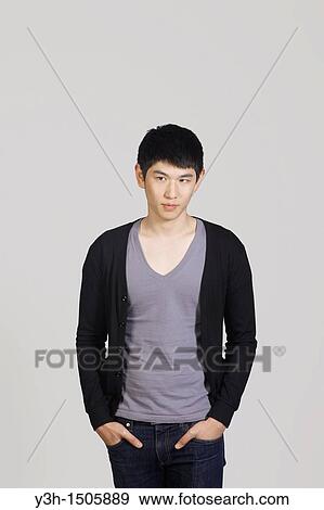 Stock Photo - Studio shot of Korean man. Fotosearch