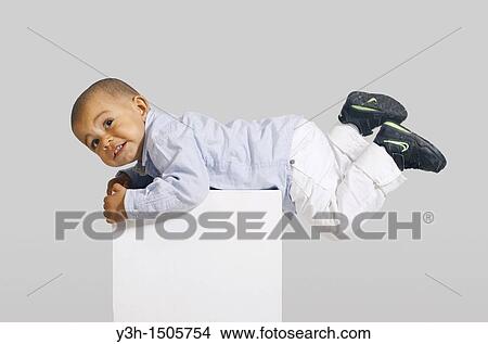 Picture - Studio shot of little boy. Fotosearch