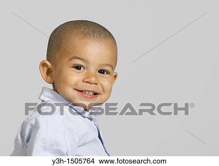 Studio shot of little boy View Large Photo Image Picture - Studio shot of little boy. Fotosearch