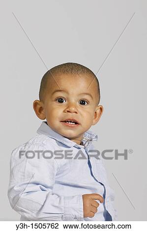 Studio shot of little boy View Large Photo Image Stock Image - Studio shot of little boy. Fotosearch