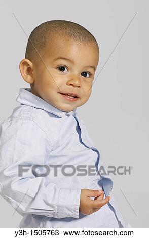 Studio shot of little boy View Large Photo Image Stock Image - Studio shot of little boy. Fotosearch