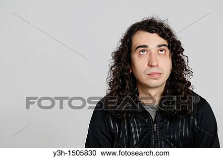 Stock Image - Studio shot of man. Fotosearch