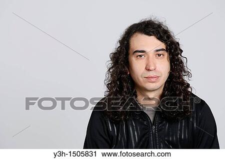 Stock Image - Studio shot of man. Fotosearch