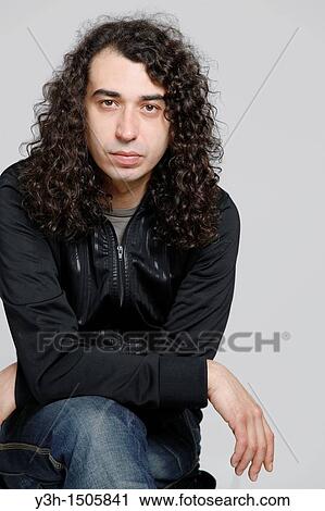 Studio shot of man View Large Photo Image Stock Image - Studio shot of man. Fotosearch