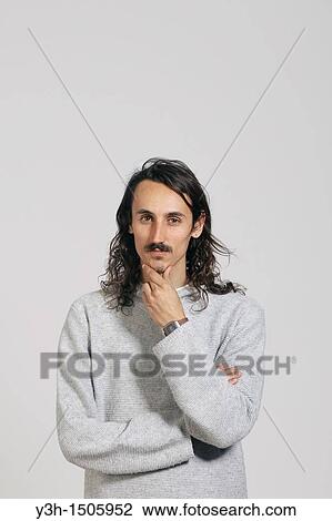 Studio shot of man View Large Photo Image Stock Image - Studio shot of man. Fotosearch