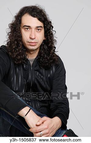 Stock Photo - Studio shot of man. Fotosearch