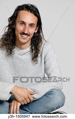 Studio shot of man View Large Photo Image Stock Photo - Studio shot of man. Fotosearch