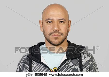 Studio shot of Mexican man, looking at camera View Large Photo Image Stock Photography - Studio shot of Mexican man, looking at camera. Fotosearch