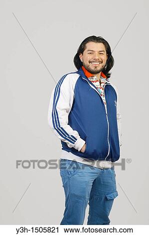 Stock Image - Studio shot of Mexican man. Fotosearch