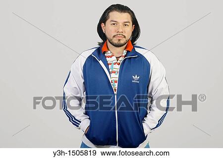 Stock Photo - Studio shot of Mexican man. Fotosearch