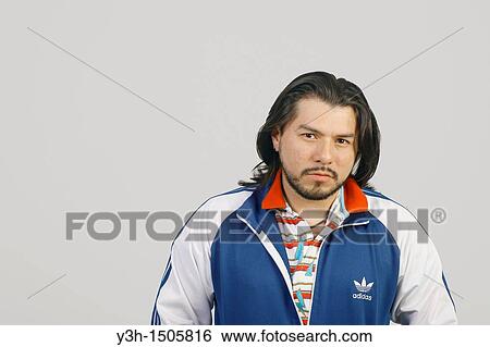 Stock Photograph - Studio shot of Mexican man. Fotosearch