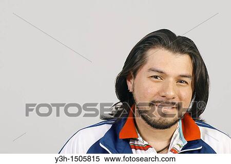 Studio shot of Mexican man View Large Photo Image Stock Photography - Studio shot of Mexican man. Fotosearch