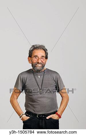 Picture - Studio shot of senior man, looking at camera. Fotosearch