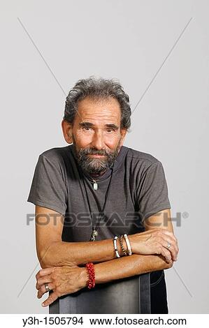 Studio shot of senior man, looking at camera View Large Photo Image Picture - Studio shot of senior man, looking at camera. Fotosearch