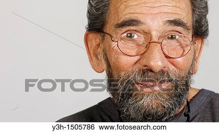 Studio shot of senior man, looking at camera View Large Photo Image Stock Photograph - Studio shot of senior man, looking at camera. Fotosearch