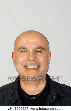 Studio shot of senior man, smiling View Large Photo Image Stock Photo - Studio shot of senior man, smiling. Fotosearch
