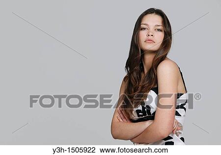 Studio shot of teen girl View Large Photo Image Stock Image - Studio shot of teen girl. Fotosearch