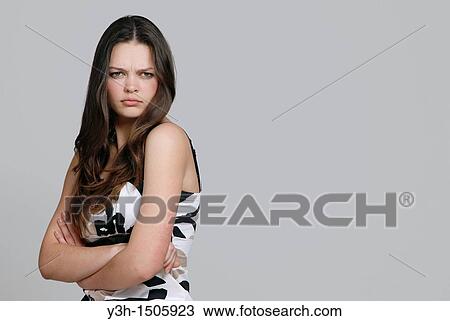 Studio shot of teen girl View Large Photo Image Stock Image - Studio shot of teen girl. Fotosearch