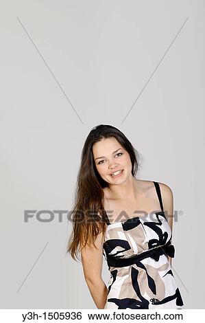 Stock Photograph - Studio shot of teen girl. Fotosearch