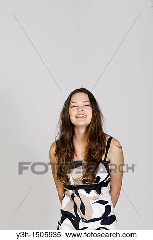Stock Photography - Studio shot of teen girl. Fotosearch