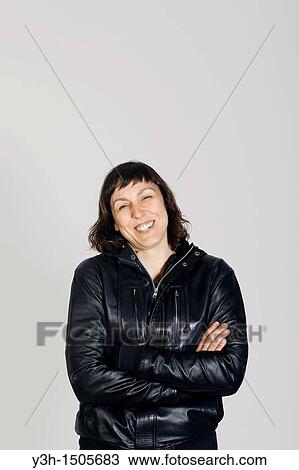 Studio shot of woman, laughing View Large Photo Image Stock Image - Studio shot of woman, laughing. Fotosearch