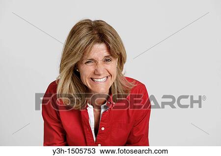 Studio shot of woman, laughing View Large Photo Image Stock Image - Studio shot of woman, laughing. Fotosearch