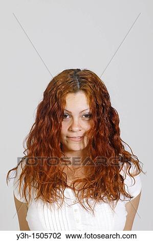 Studio shot of woman, looking at camera View Large Photo Image Stock Image - Studio shot of woman, looking at camera. Fotosearch