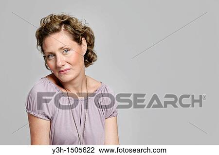 Studio shot of woman View Large Photo Image Stock Image - Studio shot of woman. Fotosearch