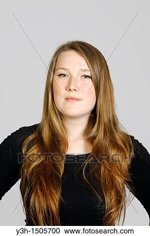 Stock Image - Studio shot of young Estonian woman, looking at camera. Fotosearch