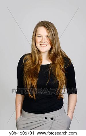 Studio shot of young Estonian woman, smiling View Large Photo Image Stock Image - Studio shot of young Estonian woman, smiling. Fotosearch