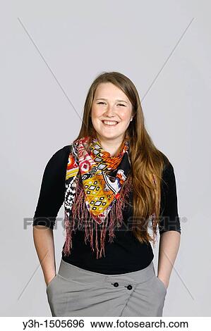 Studio shot of young Estonian woman, smiling View Large Photo Image Stock Photograph - Studio shot of young Estonian woman, smiling. Fotosearch