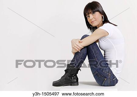Studio shot of young Italian woman, looking at camera View Large Photo Image Stock Photo - Studio shot of young Italian woman, looking at camera. Fotosearch