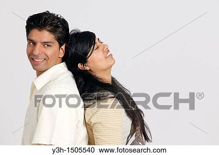 Studio shot of young pakistani couple View Large Photo Image Stock Image - Studio shot of young pakistani couple. Fotosearch