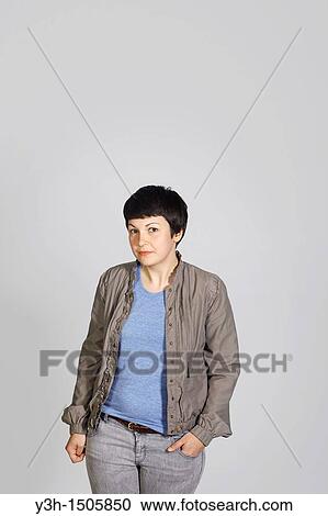 Studio shot of young woman View Large Photo Image Stock Image - Studio shot of young woman. Fotosearch