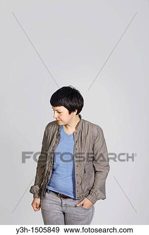 Studio shot of young woman View Large Photo Image Stock Photo - Studio shot of young woman. Fotosearch