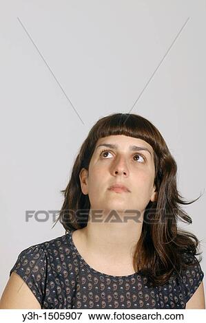 Stock Photo - Studio shot of young woman. Fotosearch