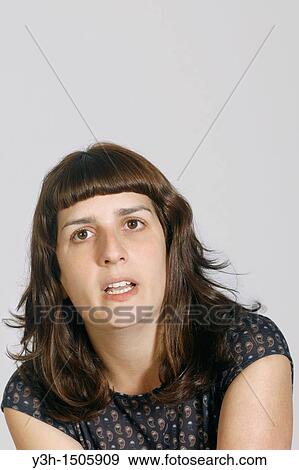 Studio shot of young woman View Large Photo Image Stock Photo - Studio shot of young woman. Fotosearch