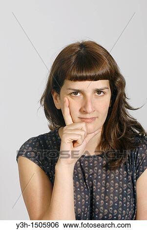Studio shot of young woman View Large Photo Image Stock Photograph - Studio shot of young woman. Fotosearch