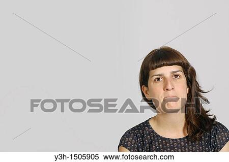 Stock Photography - Studio shot of young woman. Fotosearch