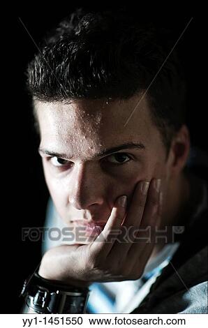 Studioportrait of a young man. View Large Photo Image Stock Image - Studioportrait of a young man.. Fotosearch