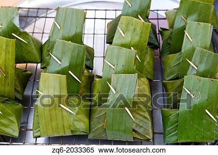 Stuffed Banana Leafs on a Market in Ao Nang, Thailand. View Large Photo Image Stock Photography - Stuffed Banana Leafs on a Market in Ao Nang, Thailand.. Fotosearch